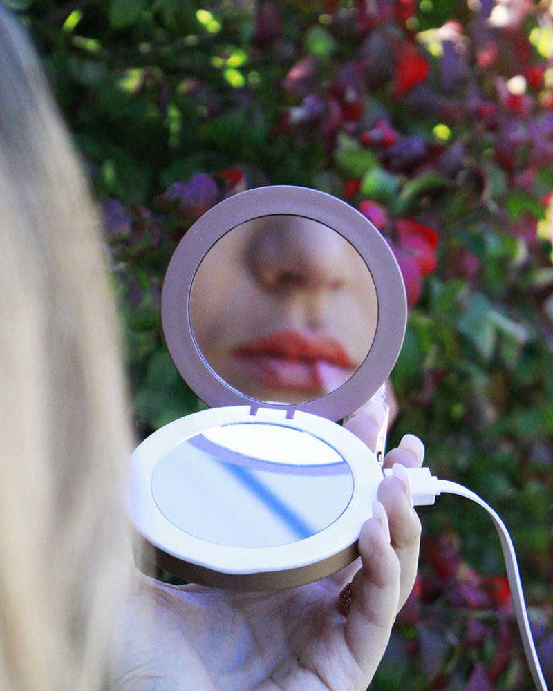 Portable phone charger mirror for makeup