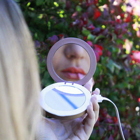 Portable phone charger mirror for makeup