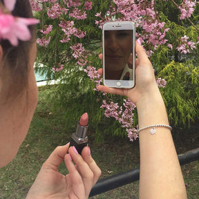Mirrored screen protector for makeup application
